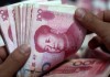 Китай вновь девальвировал юань