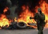 Пилота сбитого над Славянском (Украина) вертолета доставили в штаб ополчения