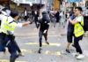 Полиция в Гонконге опять стреляла боевыми, а сторонника Пекина облили горючей жидкостью и подожгли